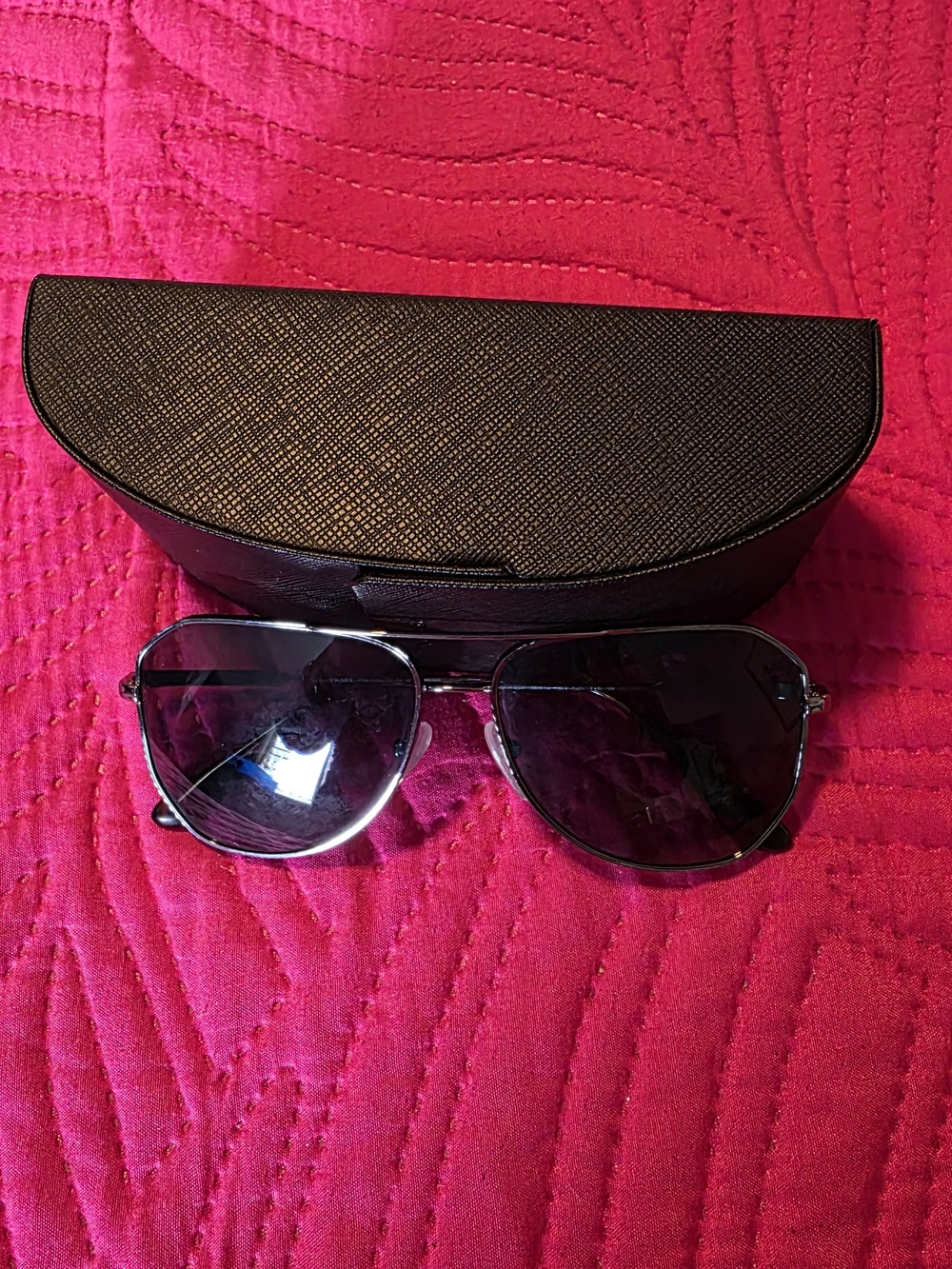 Prada Silver Frame Sunglasses with Dark Gray Lenses